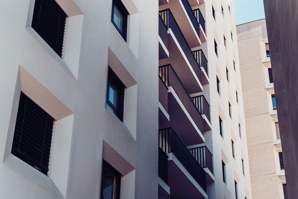 Multi-storey block of flats illustrating premises where routine fire door inspections are required under fire safety regulations.