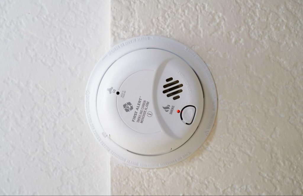 Multi-storey residential building representing properties where smoke alarm positioning must comply with Building Regulations.