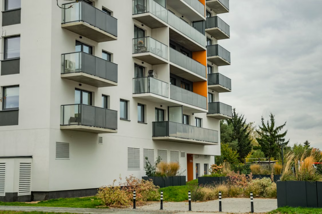 Multi-storey residential building representing properties where smoke alarm positioning must comply with Building Regulations.